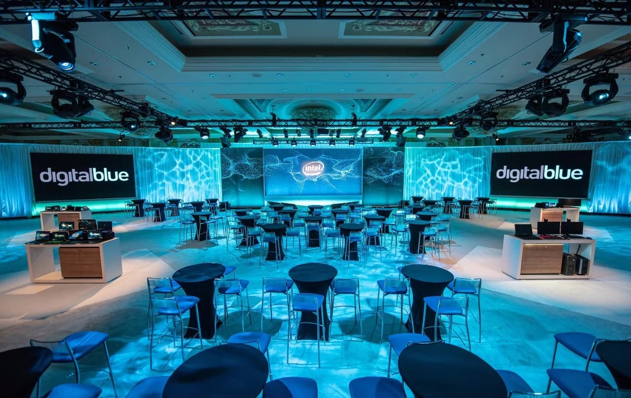 Intel CES retail experience room with illuminated displays and conversation tables
