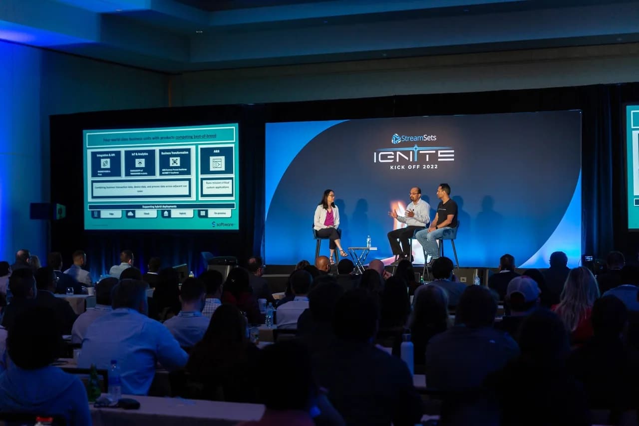 StreamSets Ignite presenters on stage in front of an audience