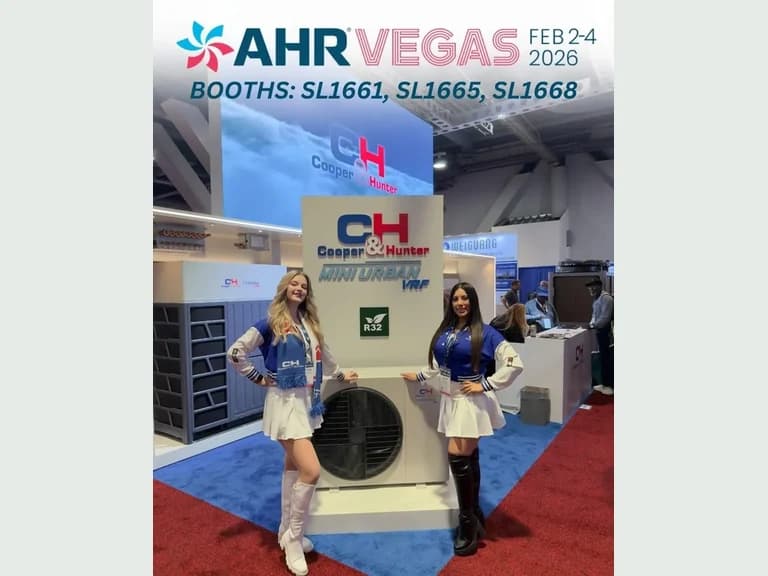 Two Cooper and Hunter ambassadors beside an HVAC display at AHR Expo