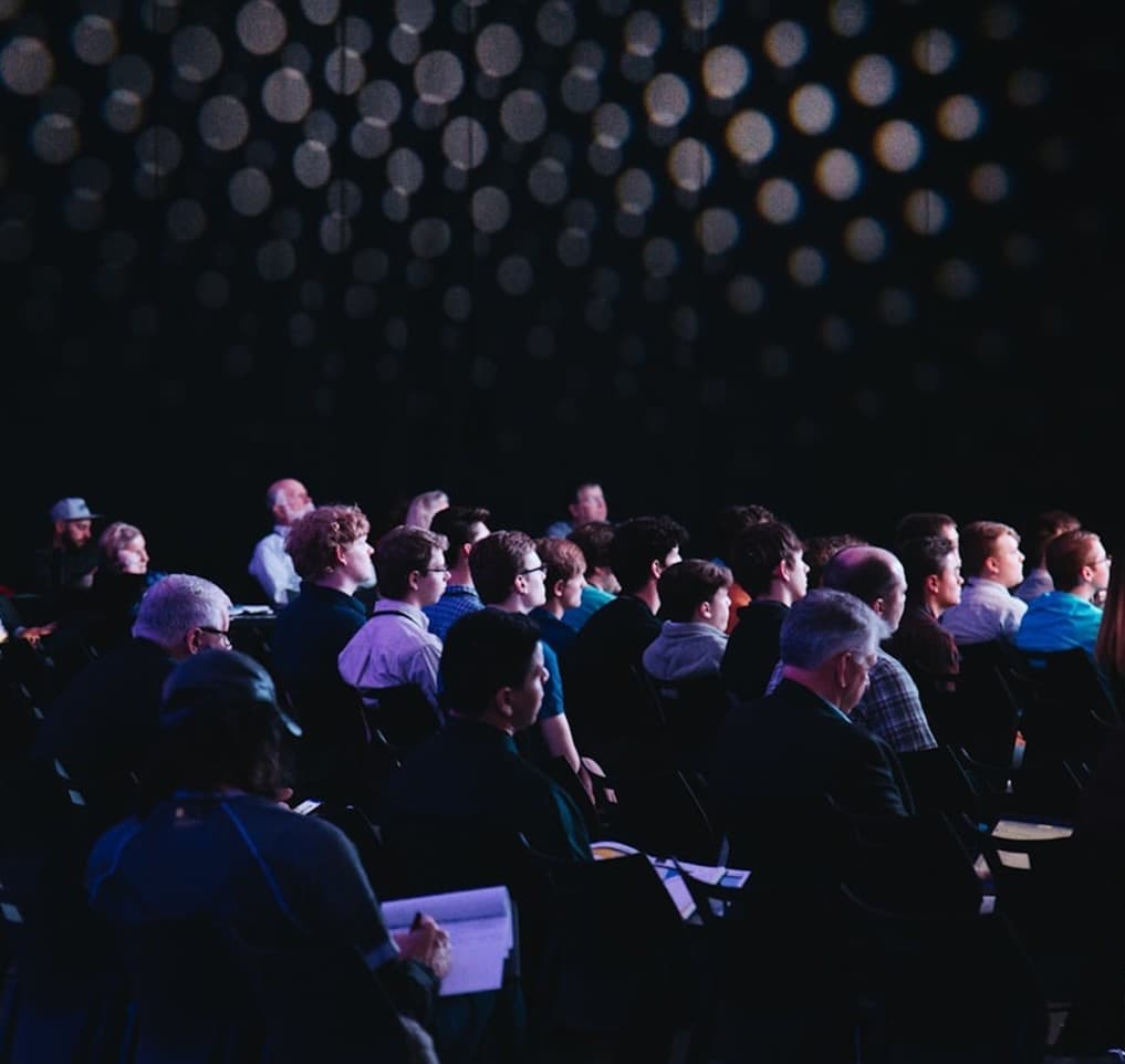 Business attendees networking at a professional conference
